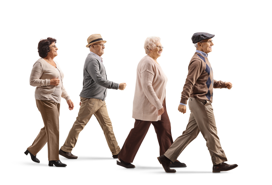 four people walking like the beatles